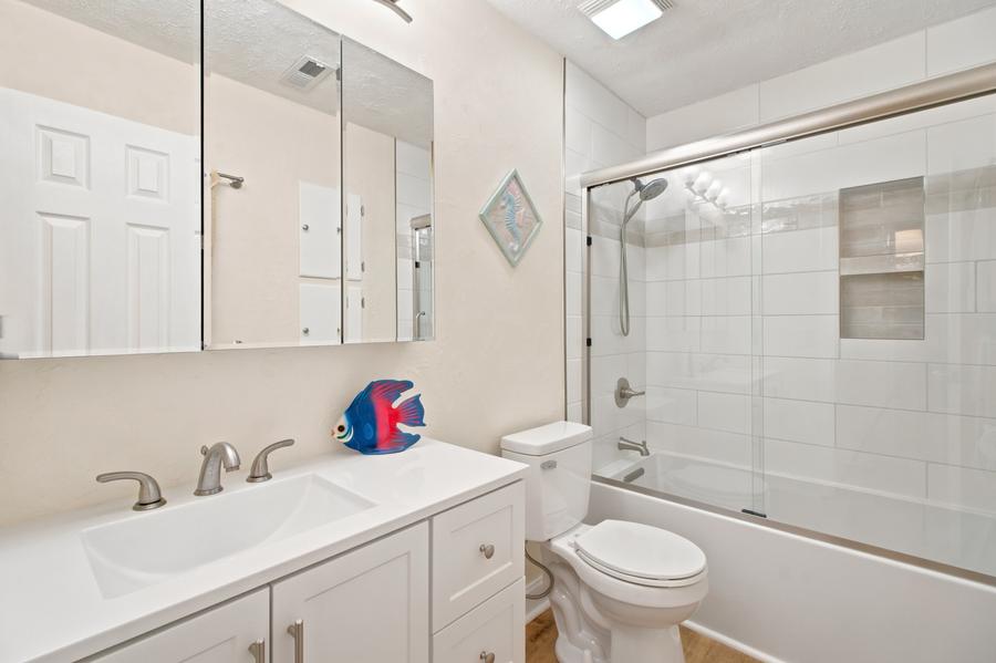 Bathroom with tub and shower